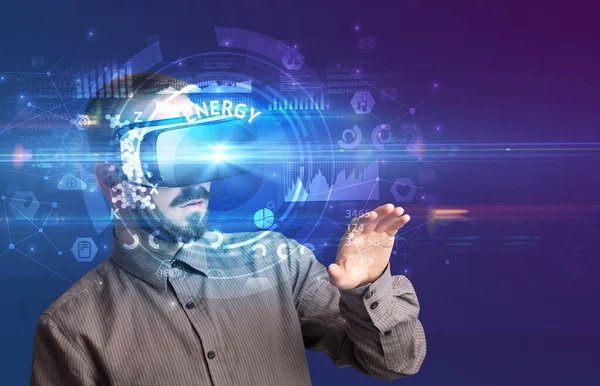 Businessman looking through VR glasses — Stock Photo, Image