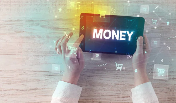 Close-up of a hand holding tablet with shopping inscription — Stock Photo, Image