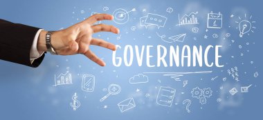 İşletme yazıtlarına işaret eden kırpılmış elin yakın çekimi