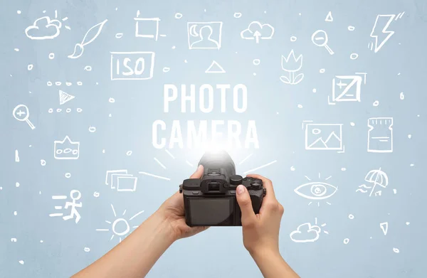 Hand taking picture with digital camera — Stock Photo, Image