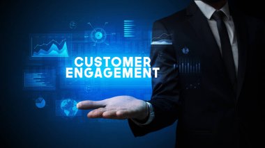 Motivasyon mesajı taşıyan iş adamının eli