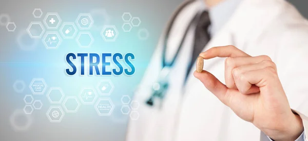 Close-up of a doctor giving you a pill — Stock Photo, Image