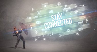 Şemsiyeyle savunma yapan iş adamı