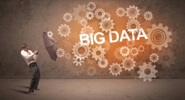 Şemsiyeyle savunma yapan iş adamı