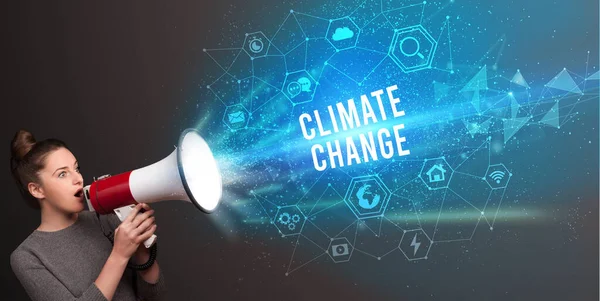 Young woman shouting in megaphone, technology announcement concept — Stock Photo, Image