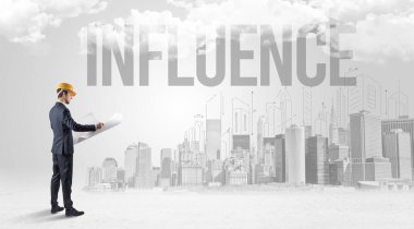 Sert şapkalı genç işadamı