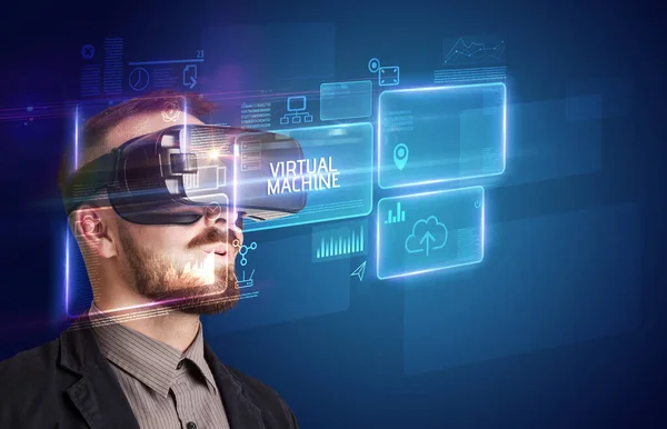 Businessman looking through Virtual Reality glasses, tech concept — Stock Photo, Image