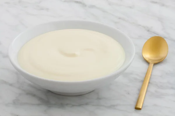 Gorgeous Styled Greek Yogurt Carrara Marble Countertop — Stock Photo, Image