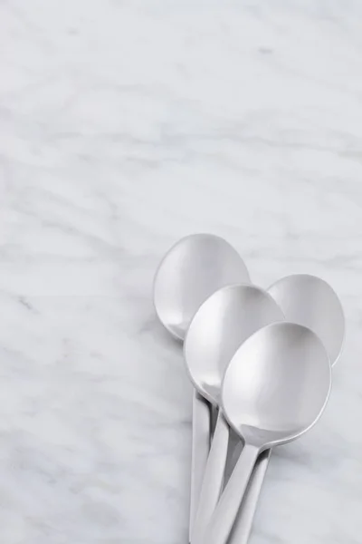 Silver Spoon Set Styled Antique Carrara Marble — Stock Photo, Image