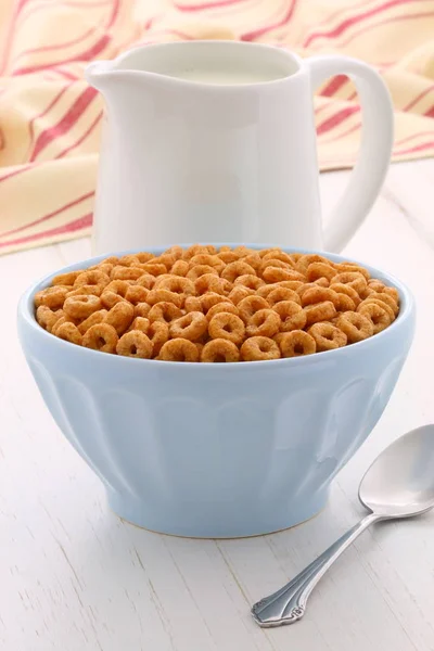 Delicious and nutritious lightly toasted breakfast honey nuts cereal loops on vintage styling