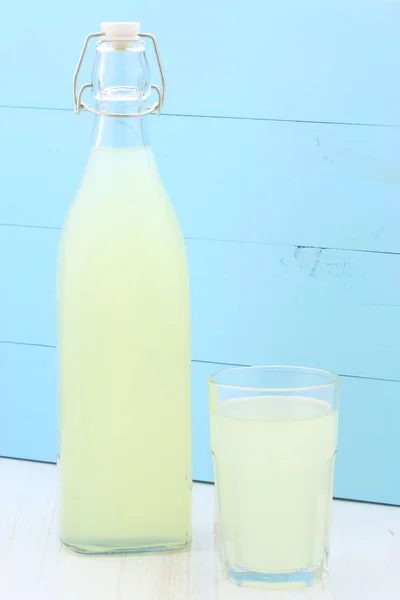 delicious and nutritious, organic lemonade on vintage bottle and glass