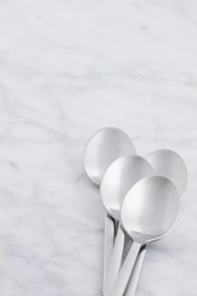 Silver Spoon Set Styled Antique Carrara Marble — Stock Photo, Image