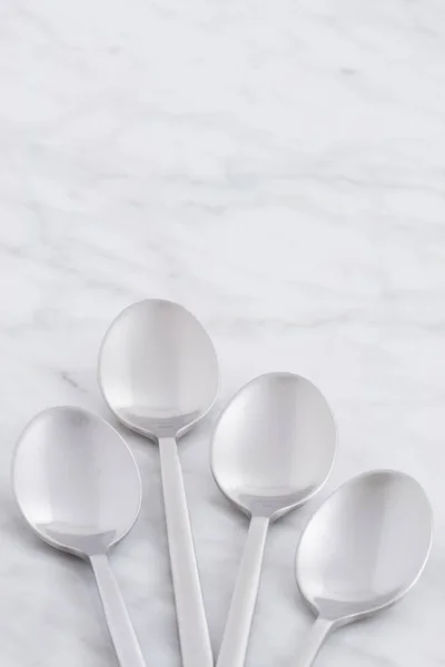 Silver Spoon Set Styled Antique Carrara Marble — Stock Photo, Image