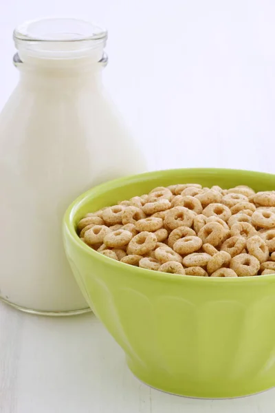 Delicious and nutritious lightly toasted breakfast honey nuts cereal loops on vintage styling