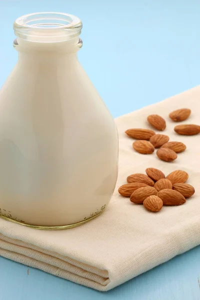 Delicious fresh almond milk, on vintage styling.