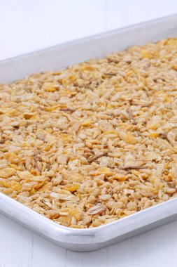 Lezzetli ve besleyici kahvaltı müsli veya granola tahıl vintage stil üzerinde hafif kızarmış.