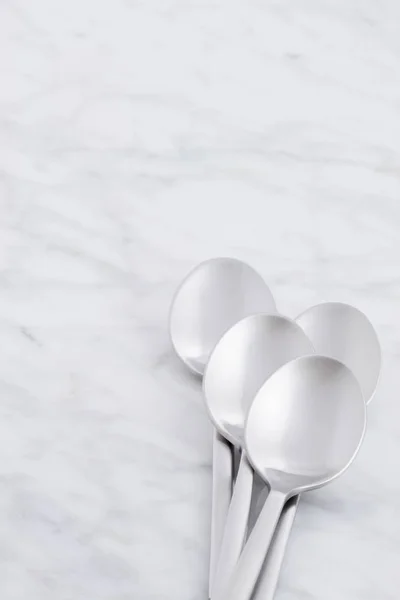 Silver Spoon Set Styled Antique Carrara Marble — Stock Photo, Image