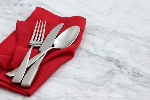 Beautiful silverware on fine napkin — Stock Photo, Image