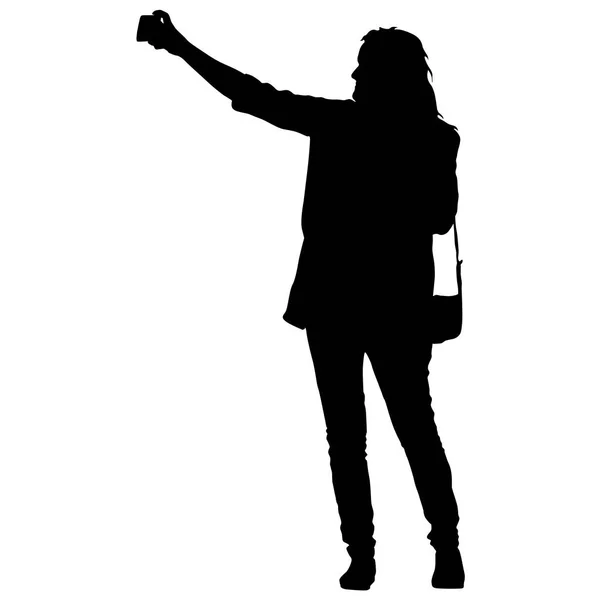 Silhuetas mulher tomando selfie com smartphone no fundo branco —  Vetores de Stock