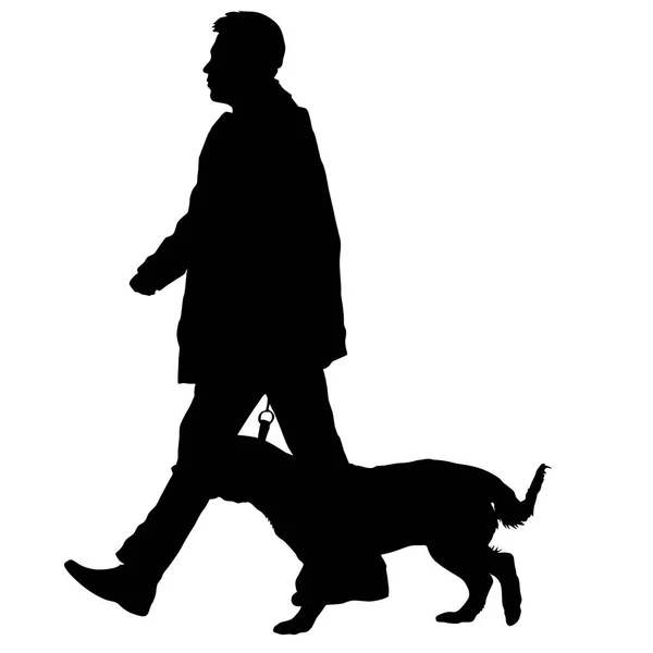 Силуэт человека и собаки на белом фоне — стоковый вектор