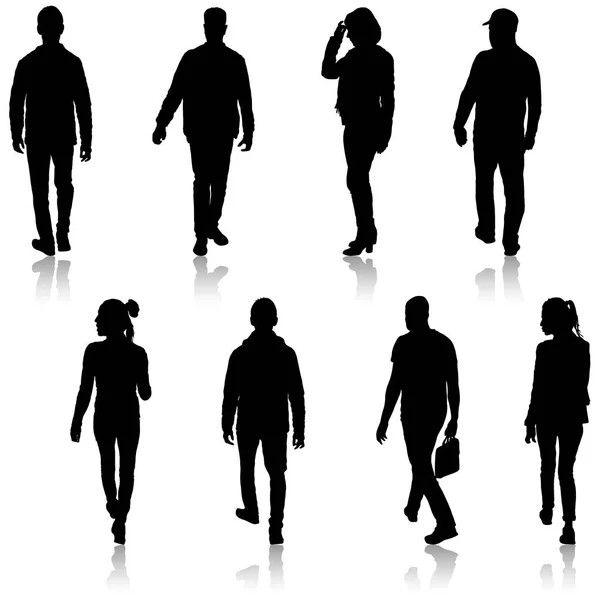 Set silhouette de personnes marchant sur fond blanc — Image vectorielle