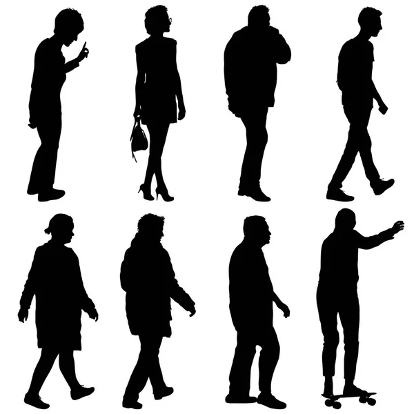 Schwarze Silhouette Gruppe von Menschen in verschiedenen Posen — Stockvektor