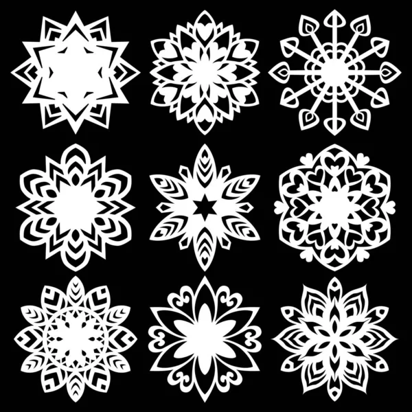 Definir silhueta de ícones de flocos de neve no fundo branco — Vetor de Stock