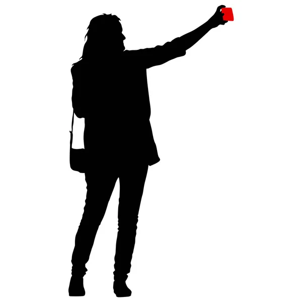 Silhuetas mulher tomando selfie com smartphone no fundo branco —  Vetores de Stock