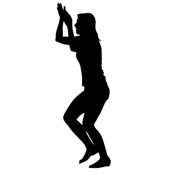 Silhuetten av folk som dansar med en upphöjd hand på vit bakgrund — Stock vektor