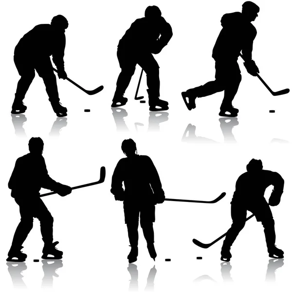 Set van silhouetten hockeyspeler. Geïsoleerd op wit — Stockvector