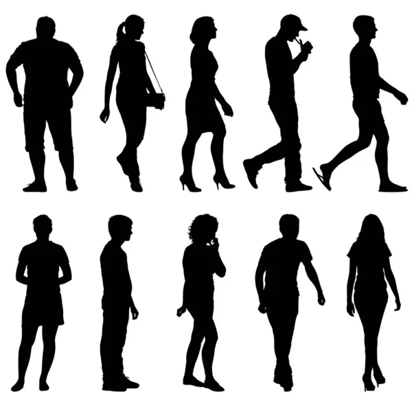 Silhouette Gruppo di persone in piedi su sfondo bianco — Vettoriale Stock