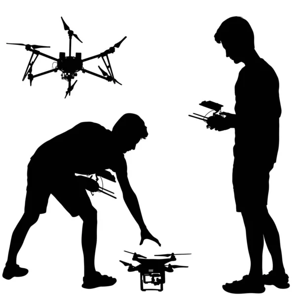 Silhouette noire d'un homme opère quadcoptère vectoriel sans pilote illustration — Image vectorielle