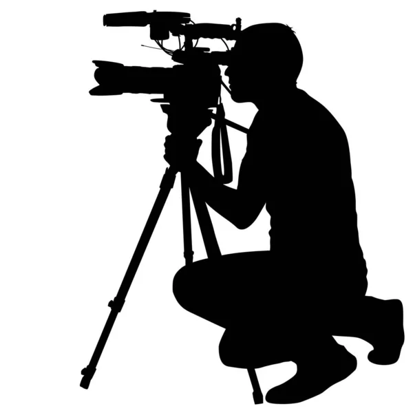 ビデオカメラ付きのカメラマン。白い背景のシルエット — ストックベクタ