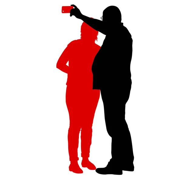 Silhuetas homem e mulher tomando selfie com smartphone no fundo branco —  Vetores de Stock