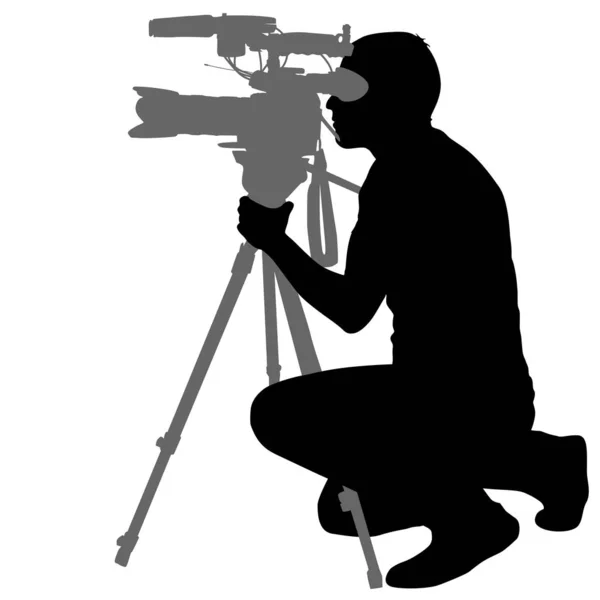 Cameraman com câmara de vídeo. Silhuetas em fundo branco —  Vetores de Stock