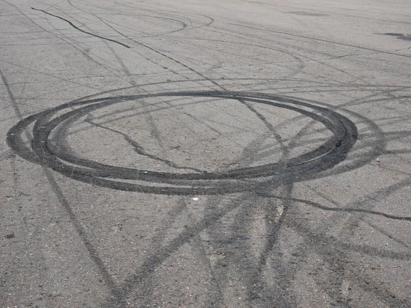 Black trail from rubber tires on the asphalt — Stock Photo, Image