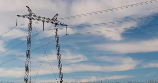 Cloudy morning sky and a high-voltage line — Stock Photo, Image