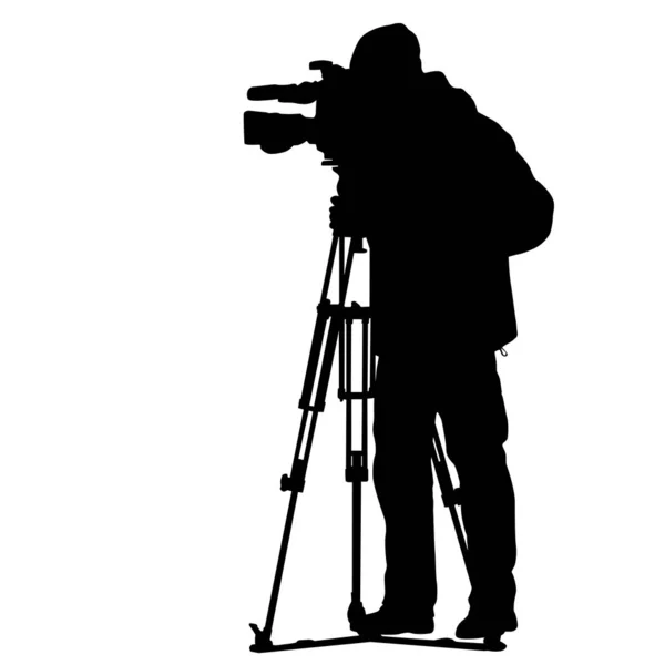 Cameraman with video camera. Silhouettes on white background — Stock Vector