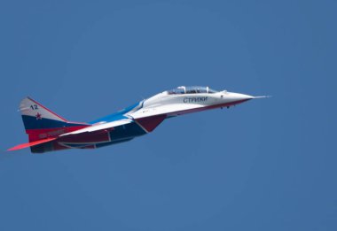 Moscow Russia Zhukovsky Airfield 31 August 2019: aerobatic team swifts MiG-29 perfoming demonstration flight of the international aerospace salon MAKS-2019. clipart