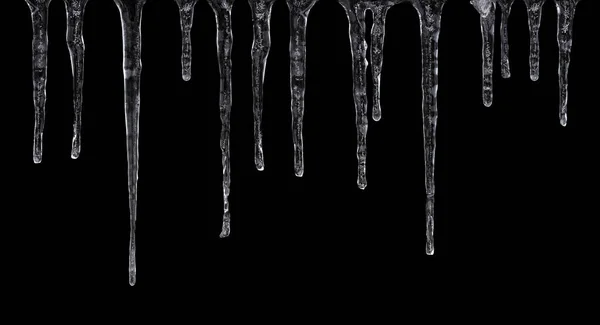 Nahaufnahme Von Eiszapfen Isoliert Auf Schwarzem Hintergrund — Stockfoto
