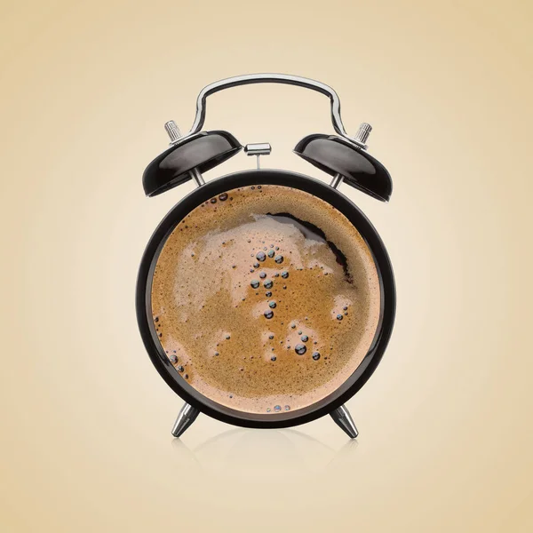 Kaffekopp kombinert med vekkerklokke – stockfoto