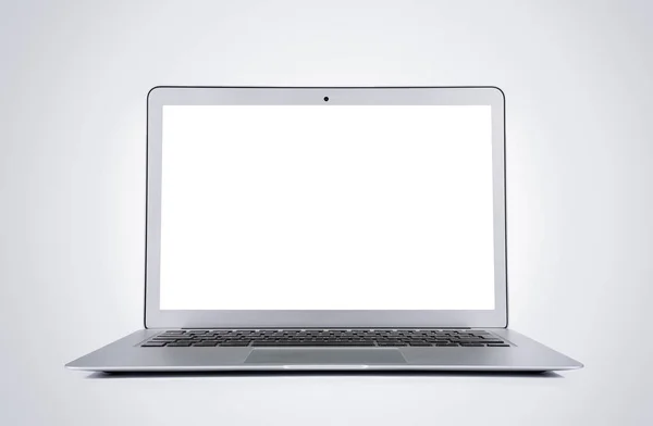 Lege moderne laptop geïsoleerd op grijze achtergrond — Stockfoto