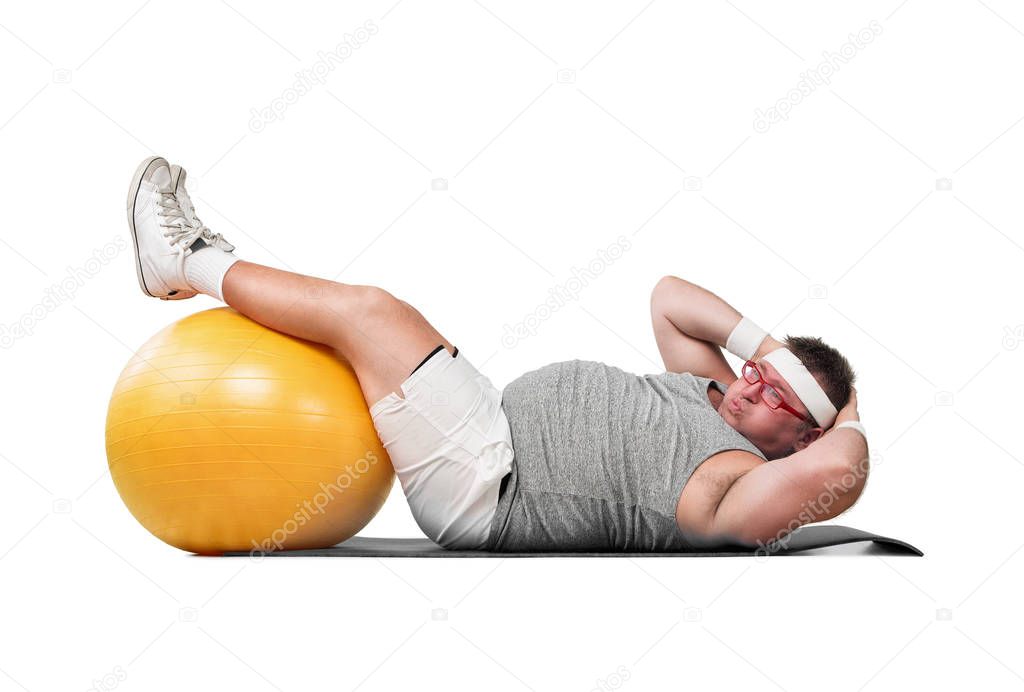 Funny overweight man working out isolated on white background
