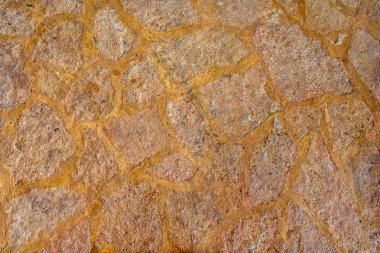 Doku taşı sarı renkli kil, döşeme levhalar sarı closeup.