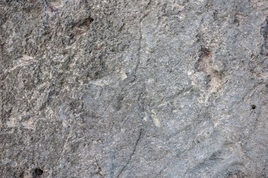 Yekpare, doğal bir taşın taş dokusu. Closeup.