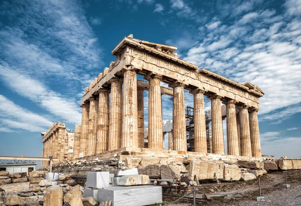 Parthenon on the Acropolis of Athens, Greece. Ancient Greek Parthenon is the main landmark of Athens. Ruins of majestic Parthenon on the hill top. Famous historical architecture of Athens in summer.