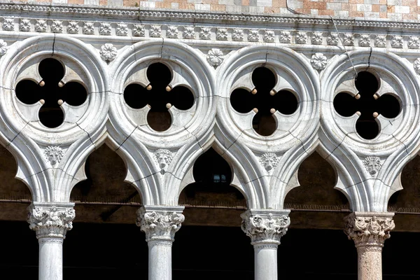 Doge\'s Palace or Palazzo Ducale, Venice, Italy. It is one of the main tourist attractions in Venice. Detail of Doge\'s Palace facade close-up. Renaissance architecture of Venice landmark.