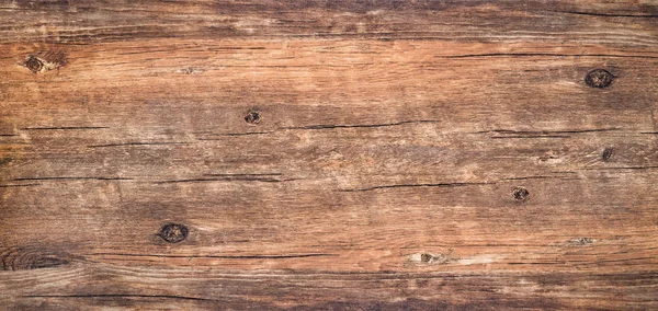 ウッド テクスチャ背景 暗いビンテージ木製テーブル 亀裂の平面図です 茶色の素朴な生木の背景に 表面は昔の自然色 テクスチャ およびパターンを持つ木材を結び目 — ストック写真