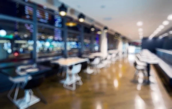 Interior of a restaurant or cafe as creative abstract blur backg