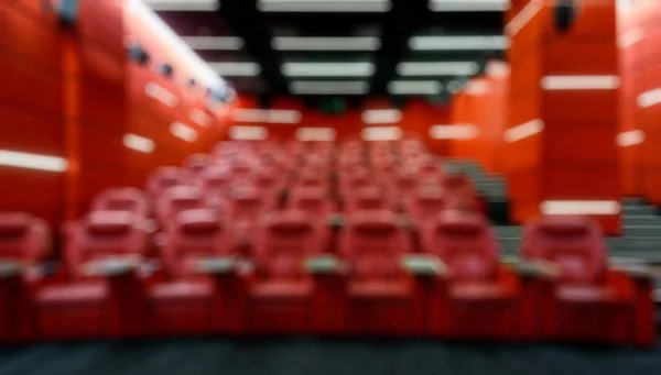 Panoramic view of an empty cinema hall as creative abstract blur — Stock Photo, Image